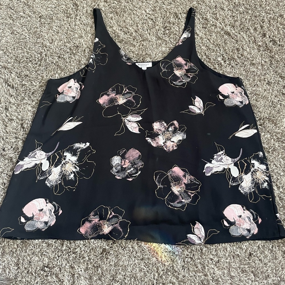 Floral tank top, very light and breathable. Only worn it once!
